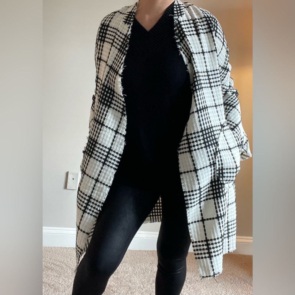 Lightweight jacket New With Tags. Never worn. Goes well with dress and leggings